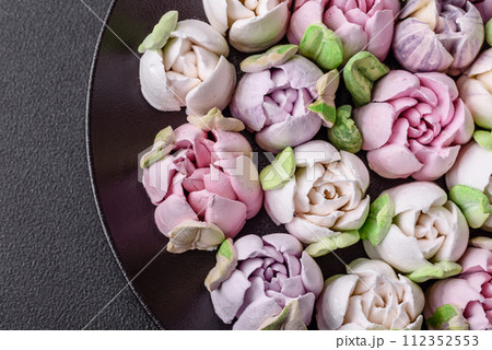 Beautiful tasty marshmallows in the form of tulip buds 112352553