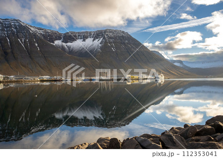 Fjord, mountains, port and cloudy sky, Iceland Fjord, mountains, port and cloudy sky, Iceland 112353041
