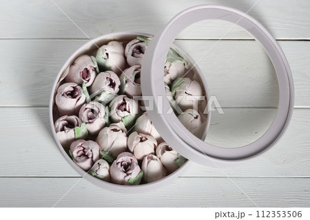 Marshmallows tulips. Marshmallow flowers. Homemade marshmallows. Top view. Marshmallows tulips. Marshmallow flowers. Homemade marshmallows. Top view. 112353506
