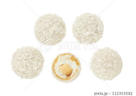 round candy raffaello with coconut flakes and nut isolated on white background. Top view. Flat lay. 112353582