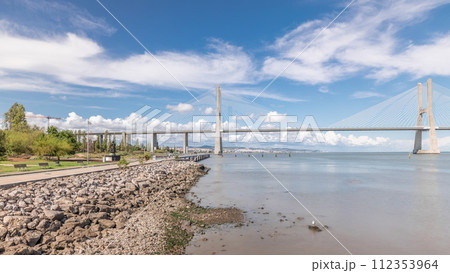 Panorama showing the Vasco da Gama Bridge timelapse in Lisbon, Portugal 112353964