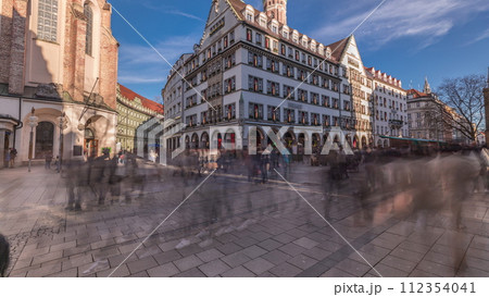 Kaufingerstrasse, shopping street and pedestrian zone in Munich downtown near the Marienplatz timelapse. Bavaria, Germany 112354041