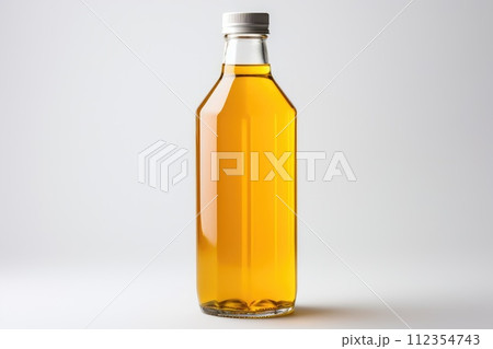 Plastic bottle of fresh apple juice on white background isolated Plastic bottle of fresh apple juice on white background isolated 112354743