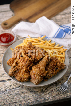 fried chicken with french fries fried chicken with french fries 112356678