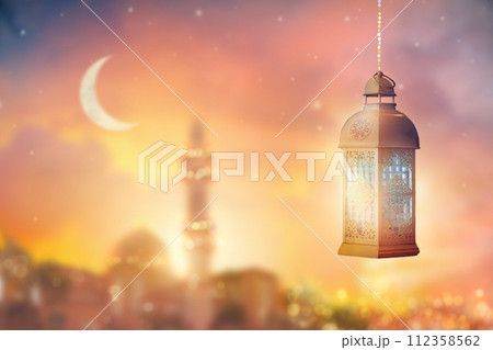 Ramadan Kareem greeting. Islamic lantern. 112358562