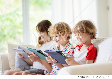 Kids with mobile phone. Child with tablet computer 112358563
