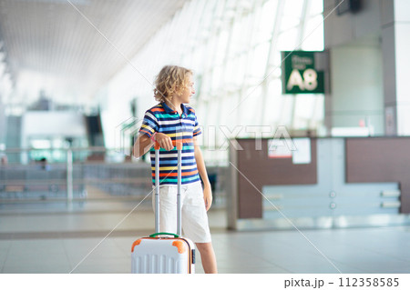 Family in airport. Kids fly. Travel with child. Family in airport. Kids fly. Travel with child. 112358585