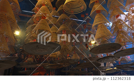 large amount of incense coils at the top of hong kong Chinese taoist temple large amount of incense coils at the top of hong kong Chinese taoist temple 112362318