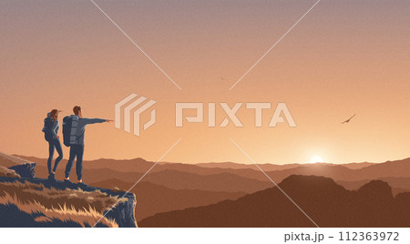 a couple observing and admiring the view on the peak of the cliff with the background of a vast landscape of hundreds of mountains. a couple observing and admiring the view on the peak of the cliff with the background of a vast landscape of hundreds of mountains. 112363972