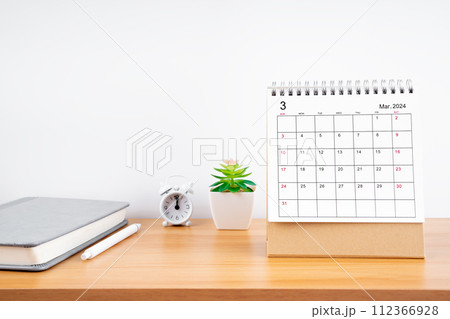 March 2024, Monthly desk calendar for 2024 year on wooden table. March 2024, Monthly desk calendar for 2024 year on wooden table. 112366928