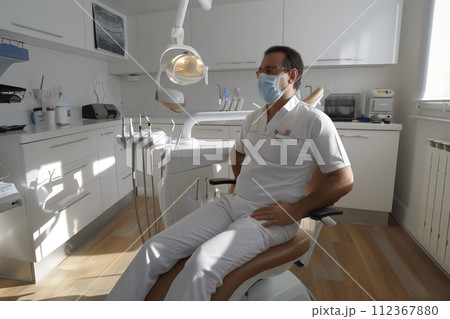 patient sitting in the chair in a dental clinic 112367880