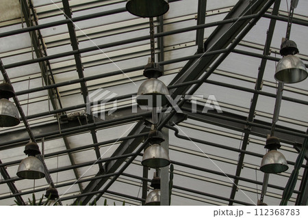 Botanical garden. Under the roof special lamps with daylight ligth temperature. 112368783