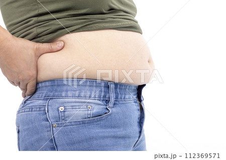 fat woman, fat belly, obese woman hand holding excessive belly fat fat woman, fat belly, obese woman hand holding excessive belly fat 112369571