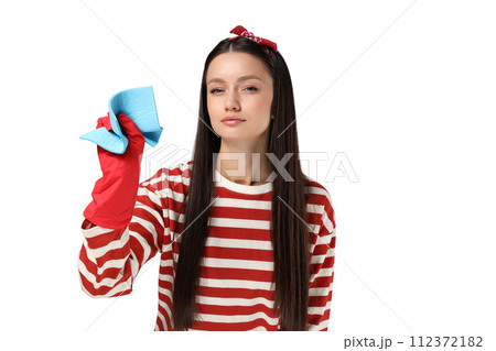 Housewife girl with means for cleaning the house, on a gray background. Housewife girl with means for cleaning the house, on a gray background. 112372182
