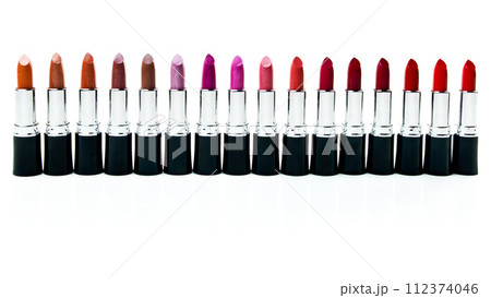Product, gloss and matte lipstick for makeup, beauty and cosmetics isolated on white background for creativity. Abstract, tools and set of rouge for art, color and silver case for makeover in studio Product, gloss and matte lipstick for makeup, beauty and cosmetics isolated on white background for creativity. Abstract, tools and set of rouge for art, color and silver case for makeover in studio 112374046