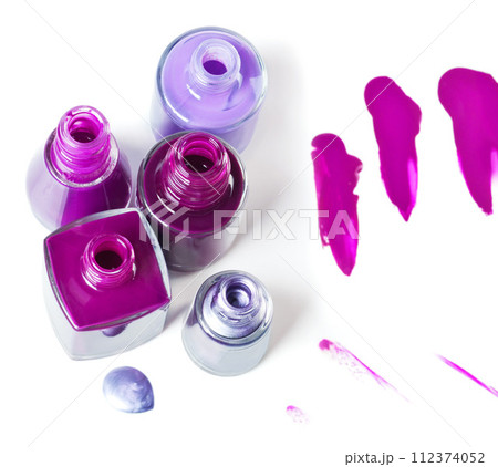 Nail, polish or bottle to spill in cosmetics, hand care or beauty art as luxury, manicure or pedicure. Creative aesthetic, varnish or color paint pattern as liquid drip effect on white background Nail, polish or bottle to spill in cosmetics, hand care or beauty art as luxury, manicure or pedicure. Creative aesthetic, varnish or color paint pattern as liquid drip effect on white background 112374052