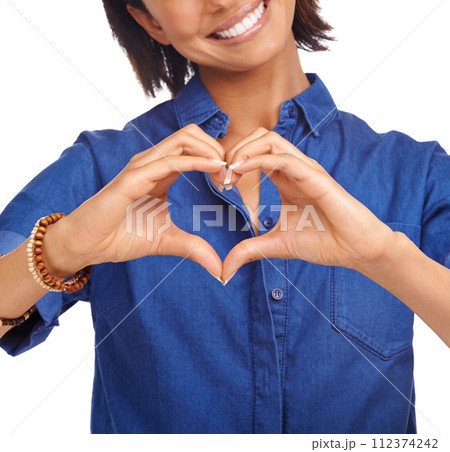Smile, heart shape or hands of happy woman with love for care, health or valentines day in studio. Wellness, white background or African lady with gesture or thank you sign for hope, support or peace Smile, heart shape or hands of happy woman with love for care, health or valentines day in studio. Wellness, white background or African lady with gesture or thank you sign for hope, support or peace 112374242