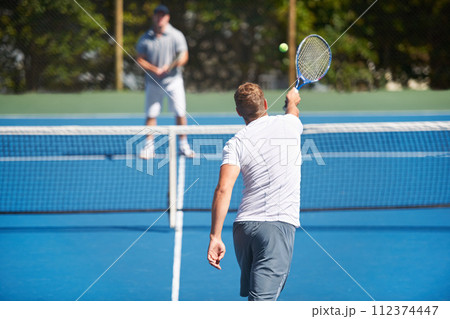 Tennis, game and men with fitness, friends and competition with training and exercise with a ball. Players, practice and guys with rackets and court with workout and sunshine with challenge or cardio 112374447