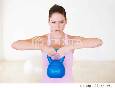 Woman, kettlebell and gym exercise for workout performance, challenge or training. Female person, arms or weightlifting for fitness sport or strong health care, muscle progress, athletic for practice Woman, kettlebell and gym exercise for workout performance, challenge or training. Female person, arms or weightlifting for fitness sport or strong health care, muscle progress, athletic for practice 112374561