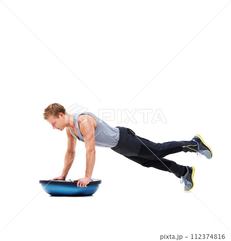 Man, body and push ups on bosu ball for fitness, exercise or workout on a white studio background. Young active male person lifting weight for strength, muscle or strong arms on mockup space 112374816