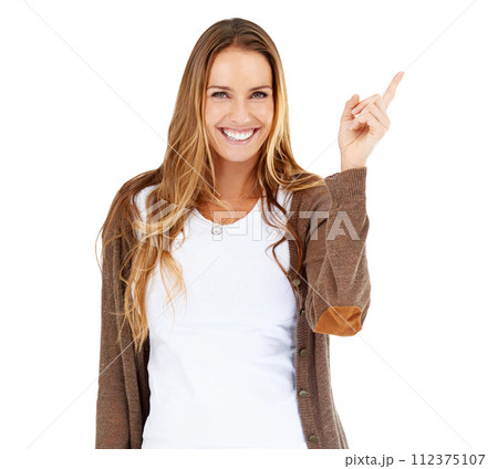 Woman, portrait and pointing for presentation in studio or announcement mockup space, opportunity or white background. Female person, face and hand gesture for review or promo, decision or opinion Woman, portrait and pointing for presentation in studio or announcement mockup space, opportunity or white background. Female person, face and hand gesture for review or promo, decision or opinion 112375107