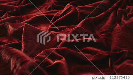 Advertising close-up shot of texture of dark red tone perfect natural velvet fabric chaotically crumpled 112375439