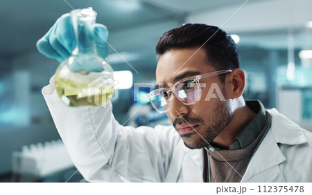 Man, scientist and shake beaker with chemical for research, experiment or test in lab. Science, serious or medical professional with glass for development of cure, biotechnology or study healthcare 112375478