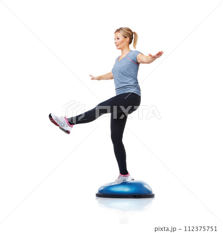 Athlete, bosu ball or leg balance in workout for body development isolated on white background. Woman, training equipment or fitness for studio mockup space, core challenge or exercise for wellness Athlete, bosu ball or leg balance in workout for body development isolated on white background. Woman, training equipment or fitness for studio mockup space, core challenge or exercise for wellness 112375751