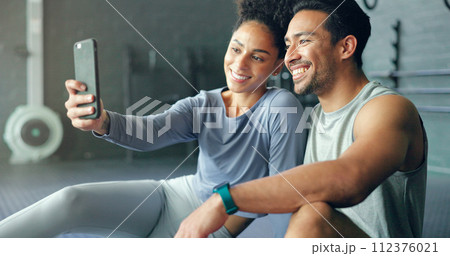 Asian man, woman or phone selfie in gym workout, training or exercise for social media, health app or fitness vlog. Smile, happy or bonding exercise friends or people on mobile photography technology 112376021
