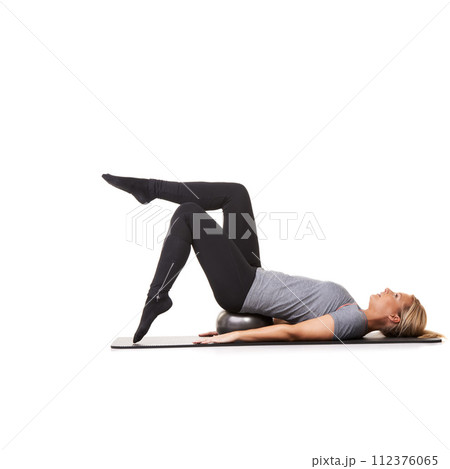 Workout legs, pilates and woman on ball in exercise, training and healthy body isolated on a white studio background mockup space. Floor, mat and person on equipment for sports, balance or fitness 112376065