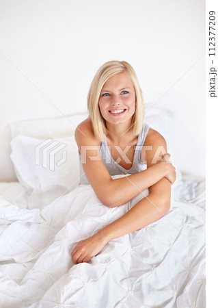 Smile, thinking and morning with woman in bed of hotel to wake up for morning hospitality or accommodation. Relax, vision and vacation with happy young blonde person in bedroom of home on weekend Smile, thinking and morning with woman in bed of hotel to wake up for morning hospitality or accommodation. Relax, vision and vacation with happy young blonde person in bedroom of home on weekend 112377209