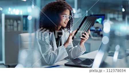 Tablet, laptop and woman scientist in lab working on medical research, project or experiment. Science, career and female researcher with digital technology and computer for pharmaceutical innovation. Tablet, laptop and woman scientist in lab working on medical research, project or experiment. Science, career and female researcher with digital technology and computer for pharmaceutical innovation. 112378034