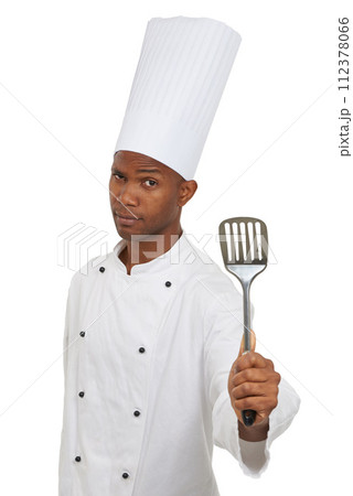 Man, chef and portrait with spatula tool in studio isolated on white background. Face, professional cook and kitchen turner, metal or utensil for serious African restaurant worker in catering service Man, chef and portrait with spatula tool in studio isolated on white background. Face, professional cook and kitchen turner, metal or utensil for serious African restaurant worker in catering service 112378066