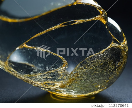 Liquid gold leaf in glass Liquid gold leaf in glass 112378641