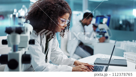 Scientist, woman and microscope with computer for laboratory research, test and DNA investigation at night. Professional doctor or science expert with lens check, laptop and particles for inspection Scientist, woman and microscope with computer for laboratory research, test and DNA investigation at night. Professional doctor or science expert with lens check, laptop and particles for inspection 112378765