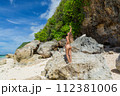 Beautiful young woman in a swimsuit in Bali 112381006