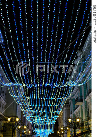Street lighting opposite black sky Street lighting opposite black sky 112381769