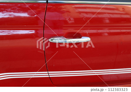 Parts of a car body close-up. Parts of a car body close-up. 112383323