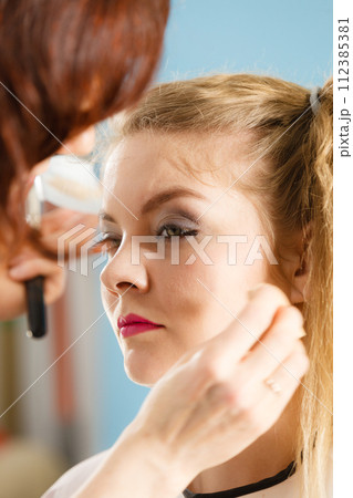 Fashion model and makeup artist 112385381