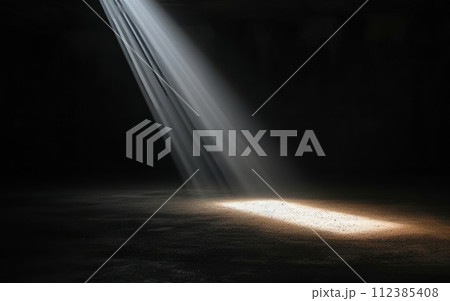A single beam of light piercing through darkness, symbolizing hope and the possibility of finding a way out of the shadow of addiction and overdose A single beam of light piercing through darkness, symbolizing hope and the possibility of finding a way out of the shadow of addiction and overdose 112385408