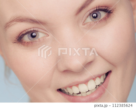 smiling woman face with make up. 112385624