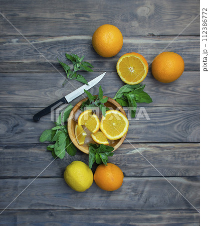 Citrus and mint. Vitamins. Fruit on the table. Immunity boosting drink and ingredients on table. 112386772