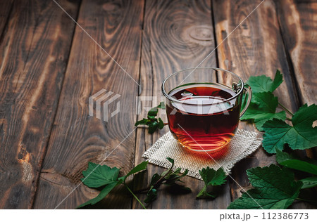 Tea concept. hot tea cup. Hot tea with the addition of spices and herbs. 112386773