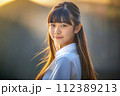portrait of a beautiful Asian young girl with long straight hair 112389213