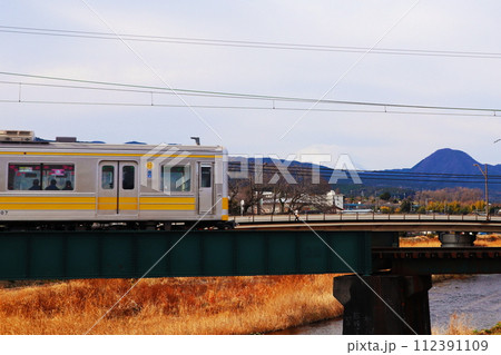 狩川橋梁を渡る伊豆箱根鉄道大雄山線の列車 狩川橋梁を渡る伊豆箱根鉄道大雄山線の列車 112391109