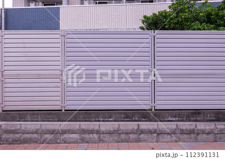 street wall background ,Industrial background, empty grunge urban street with warehouse brick wall street wall background ,Industrial background, empty grunge urban street with warehouse brick wall 112391131