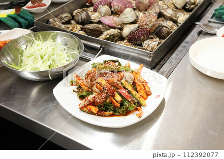 Korea style food. Raw Oyster spicy sauce Salad 112392077