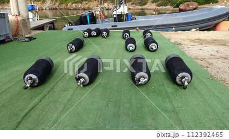 The tanks are ready for a diving trip. 112392465
