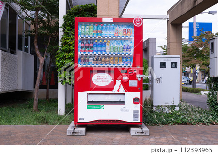Tokyo, Japan -October  1  , 2023 :  Vending machines in Tokyo, Japan. Coca-Cola vending machine on a residential street 112393965