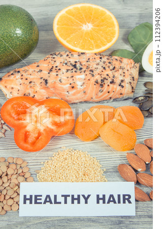 Various nutritious products or ingredients containing vitamins and minerals for healthy hair Various nutritious products or ingredients containing vitamins and minerals for healthy hair 112394206